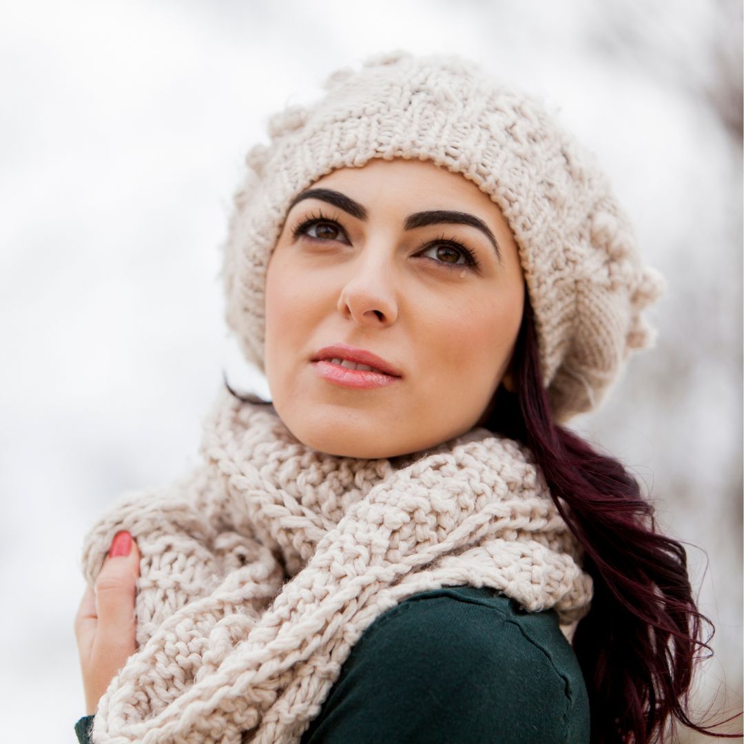 Girl wearing a scarf and beanie