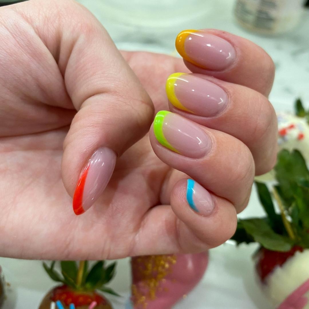 Shaped nails with coloured french tips